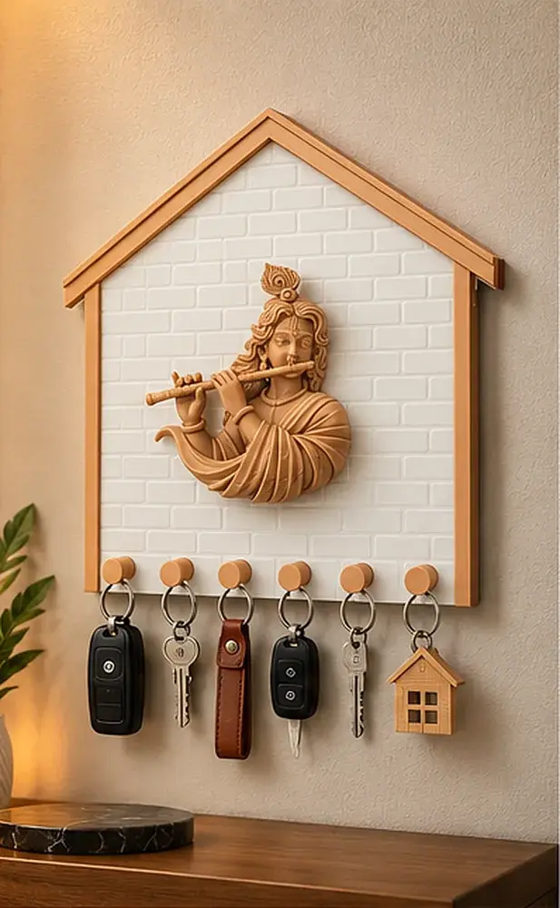 Divine Krishna Key Holder on a wall holding keys above a console table